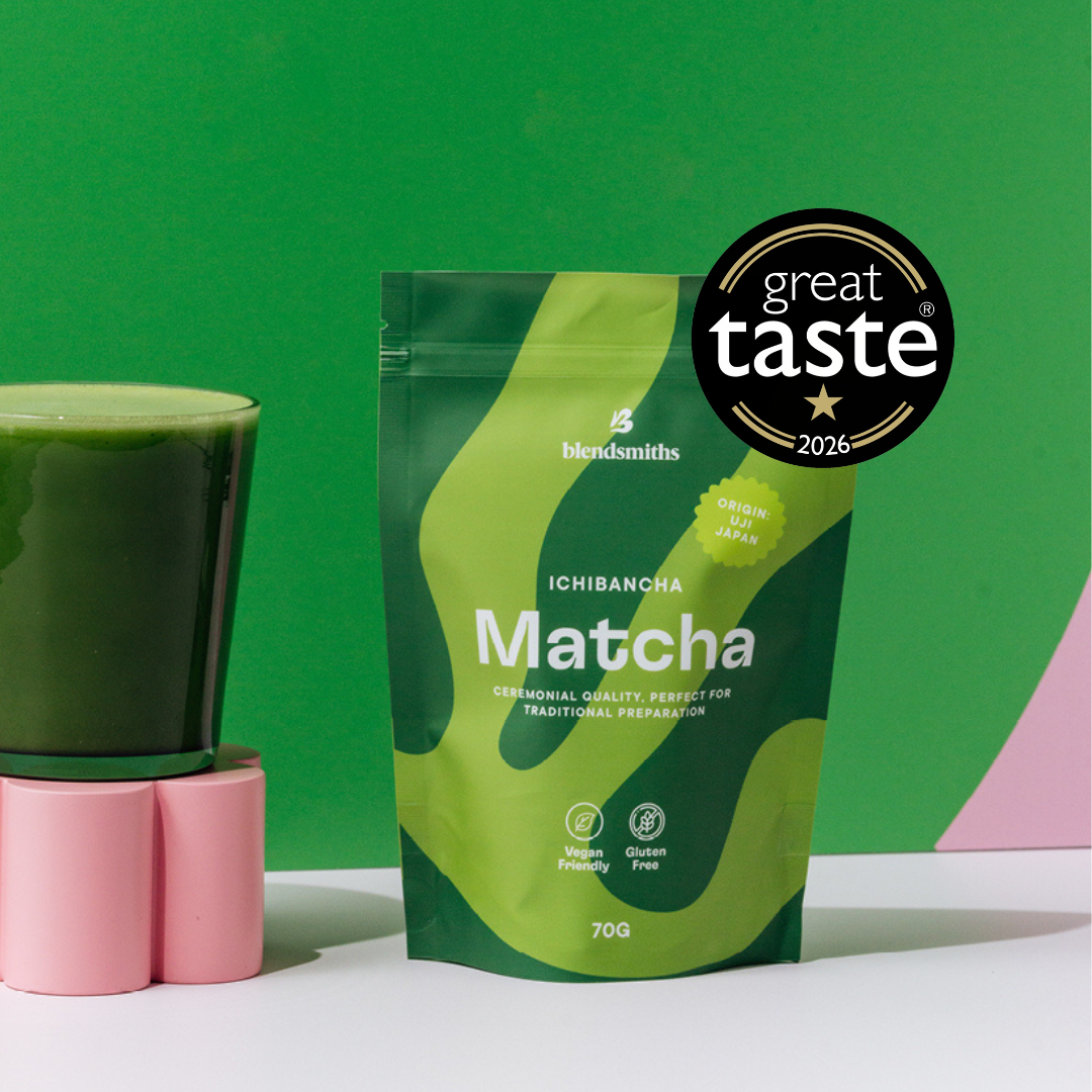 Blendsmiths 70g Ichibancha Matcha packaging next to an iced matcha drink, showcasing its Great Taste Award badge.