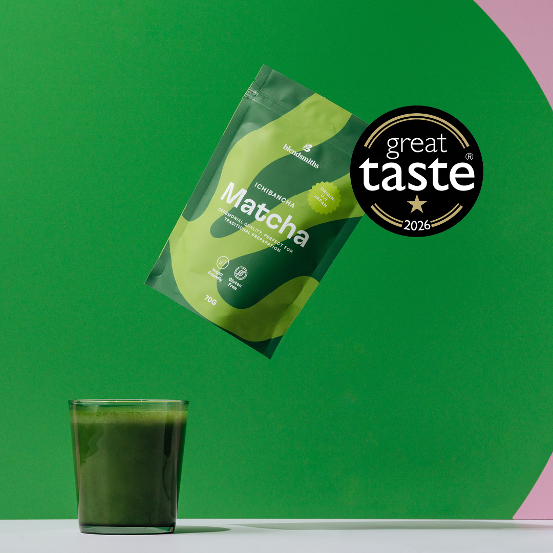Blendsmiths 70g Ichibancha Matcha packaging next to an iced matcha drink, showcasing its Great Taste Award badge.