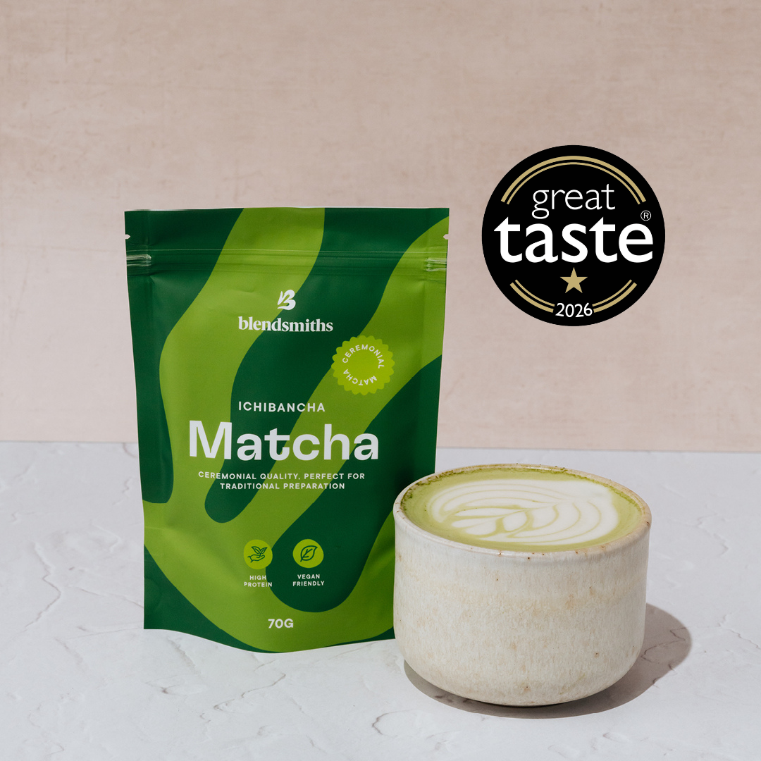 Blendsmiths 70g Ichibancha Matcha packaging next to a hot matcha latte drink, showcasing its Great Taste Award badge.